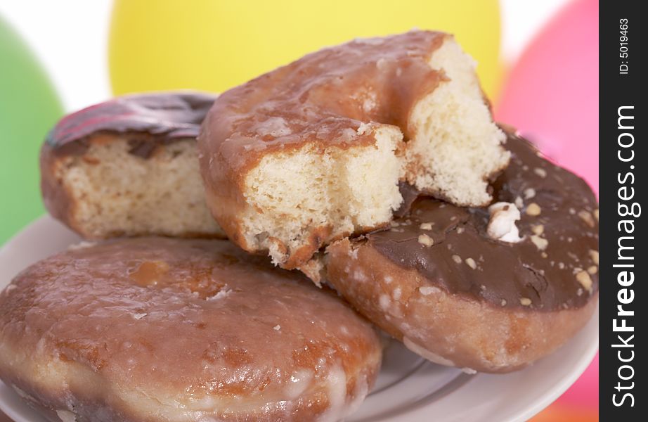 Freshly baked donuts on a white background