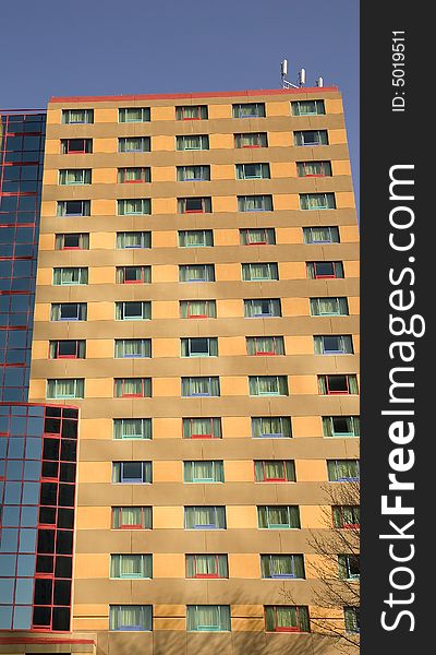 A colorful hotel with many colored windows. A colorful hotel with many colored windows