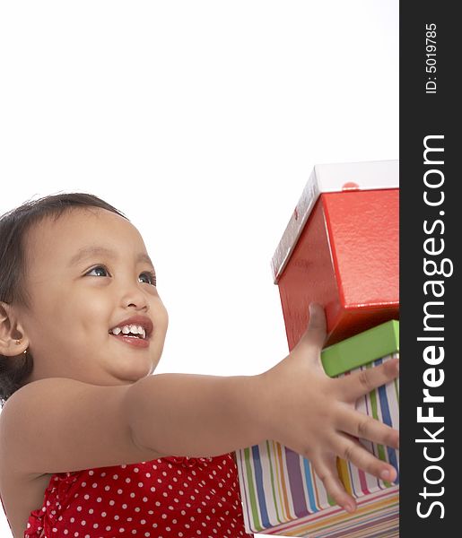 Girl holding giftbox with a different colors