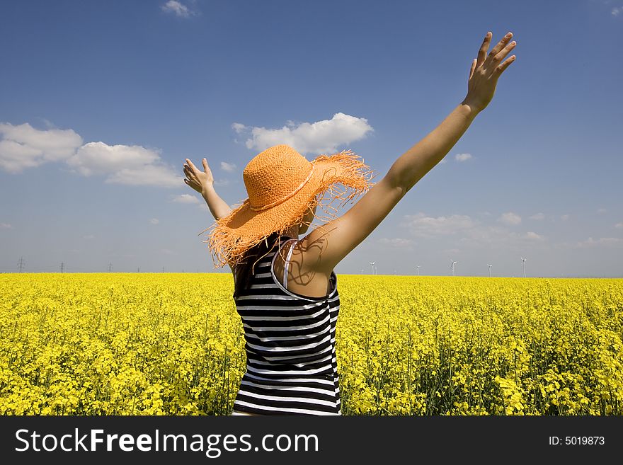 Teenagers in the field stretched hands in the air. Teenagers in the field stretched hands in the air