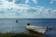 Lake View With Old Fishing Boat And Washing Woman Stock Photo Lake View With Old Fishing Boat And Washing Woman Stock Photo