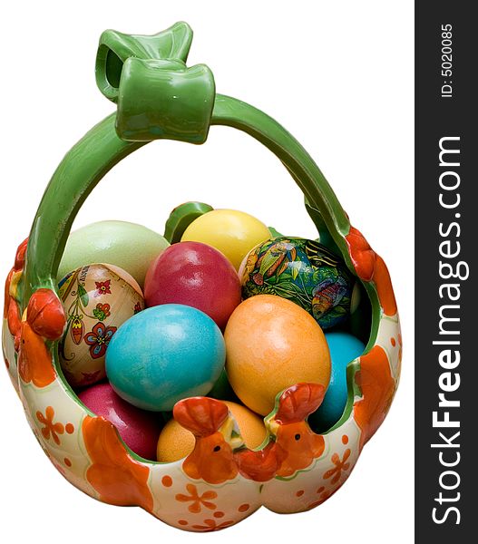 Colored easter eggs on the plate white isolated