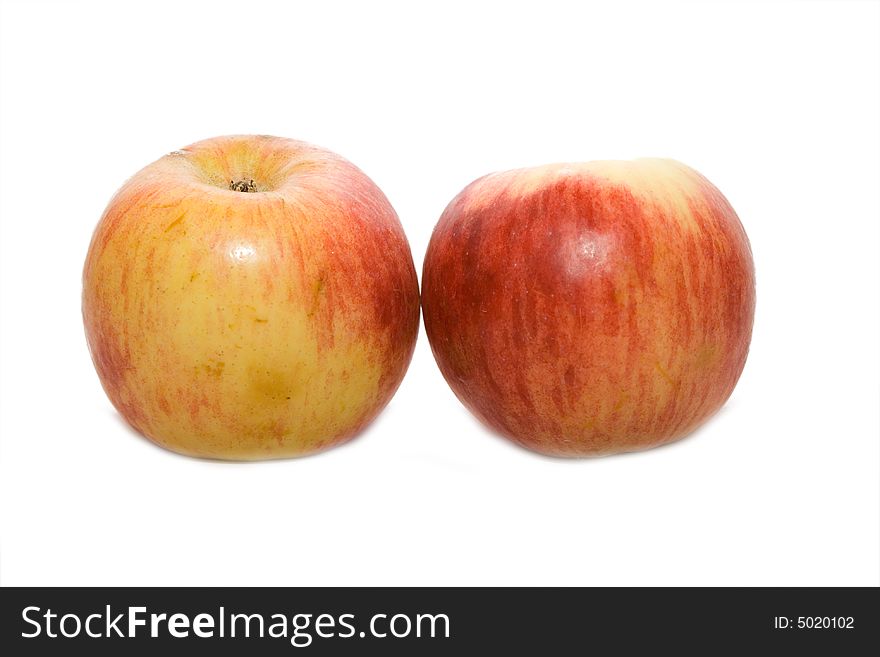 Two red apples isolated on white