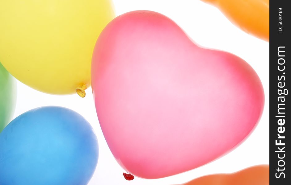 Many colorful balloons on a white background
