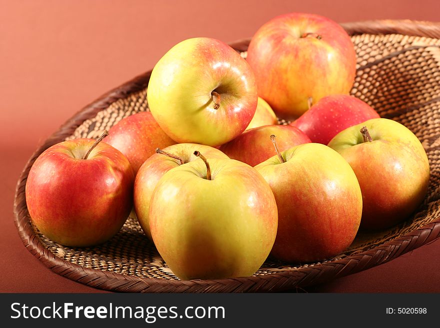 Apples on a brown background.