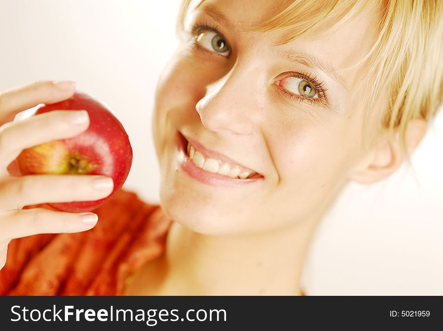 A girl with an apple