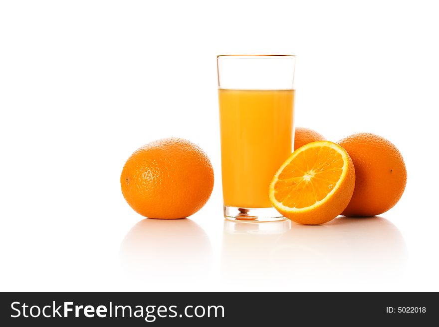 Still-life with orange juice and oranges