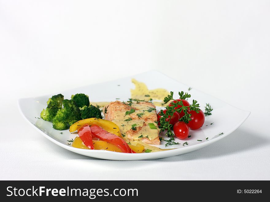 Dinner plate of baked salmon. Dinner plate of baked salmon