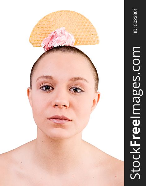Young good looking woman with a ice cream on her head. Young good looking woman with a ice cream on her head