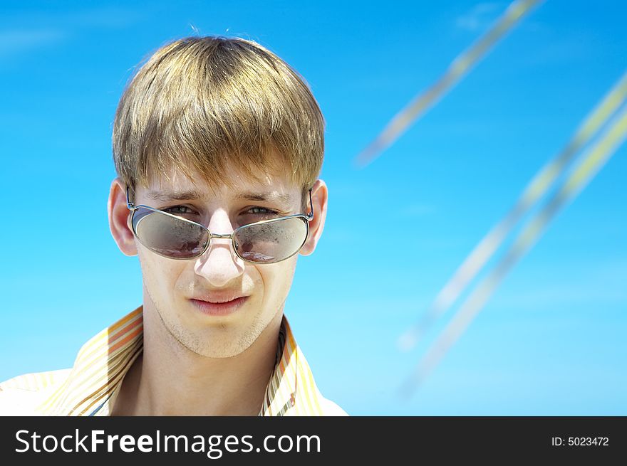 Portrait of young gorgeous male in outdoor environment. Portrait of young gorgeous male in outdoor environment