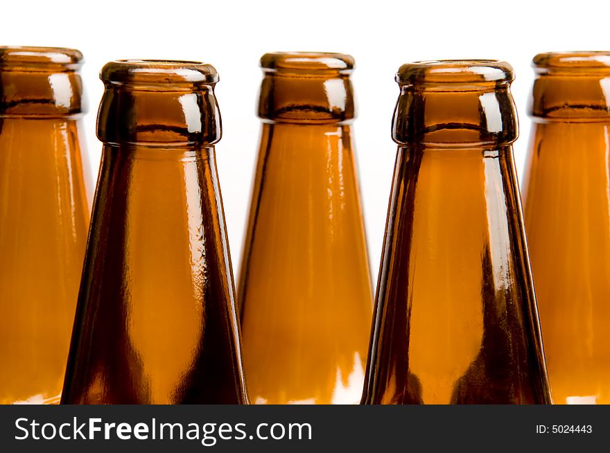 Close-up of two row of beer bottles