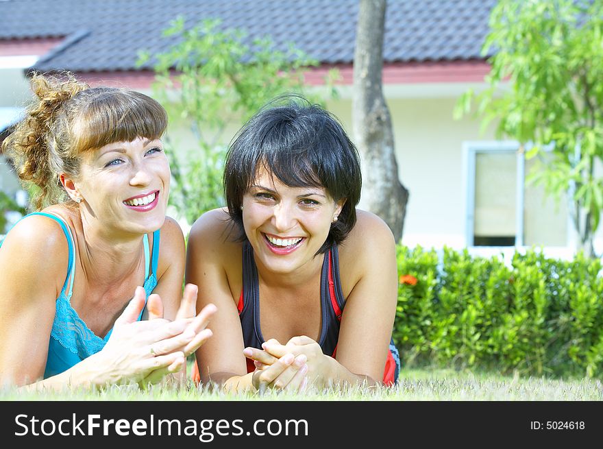 Portrait of two young woman  having fun in summer environment. Portrait of two young woman  having fun in summer environment