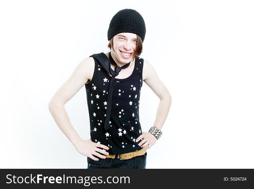 Emotional teenager in black hat smiling, isolated on white background