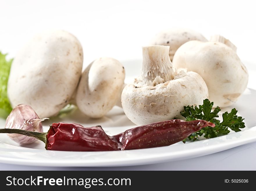 Food serias: some mushrooms on the white plate