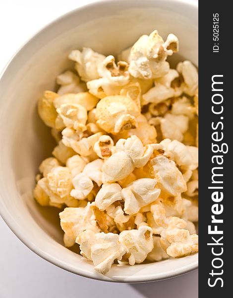 Food series: macro picture of popcorn on the bowl