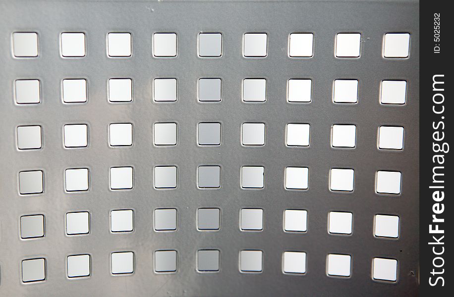 Metal with square holes. Modern background. Metal with square holes. Modern background.