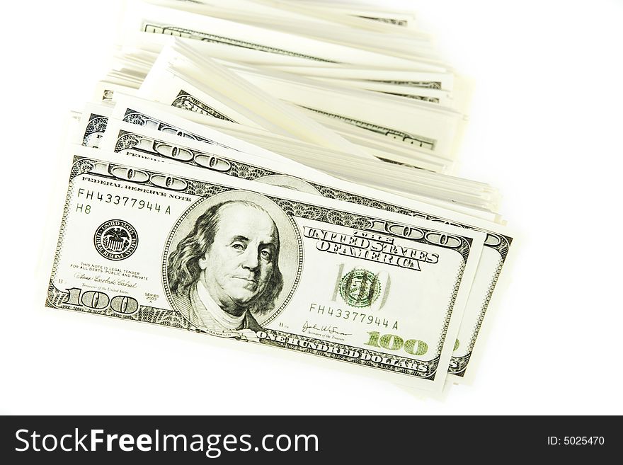 Stack of $100 bills in US currency on white background. Stack of $100 bills in US currency on white background