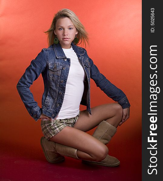 A young teenage girl posing for a fashion shoot. A young teenage girl posing for a fashion shoot