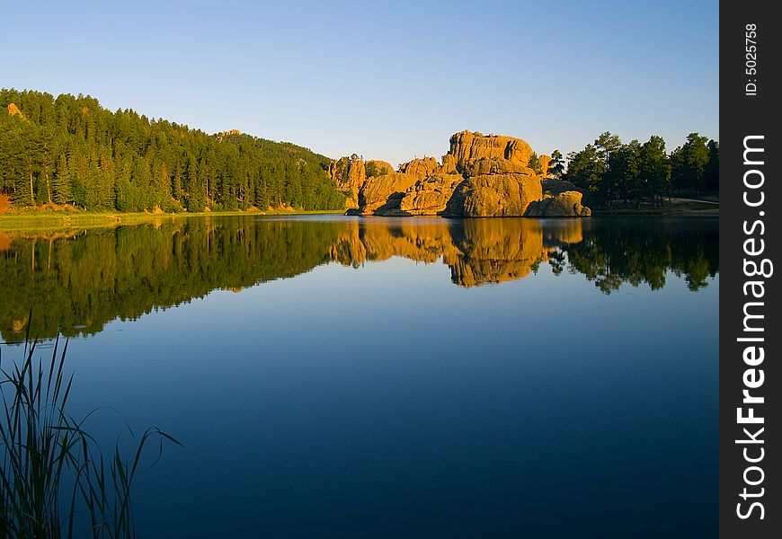 Early morning from the shore of Sylvan Lake in the Black Hills of South Dakota. Early morning from the shore of Sylvan Lake in the Black Hills of South Dakota
