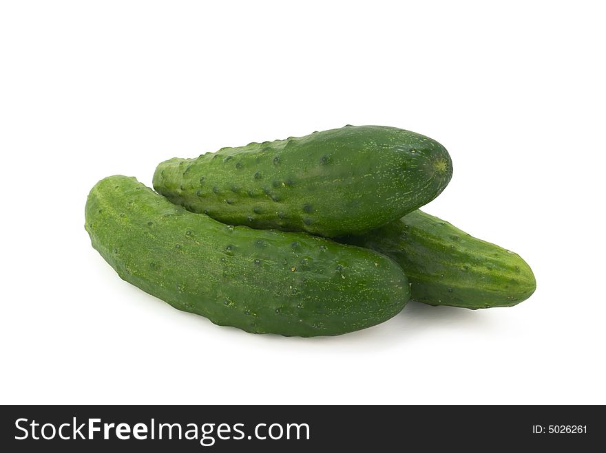 Fresh cucumbers isolated on white without shadow