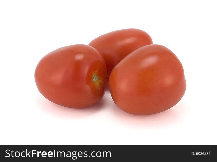 Three tomatoes isolated on white with shadow