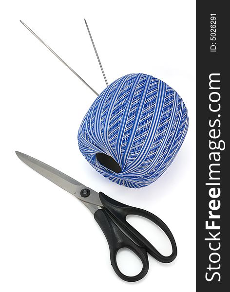 Knitting needles, ball of thread and scissors, isolated on white with shadow