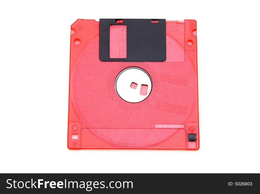 Red floppy disk over a white surface