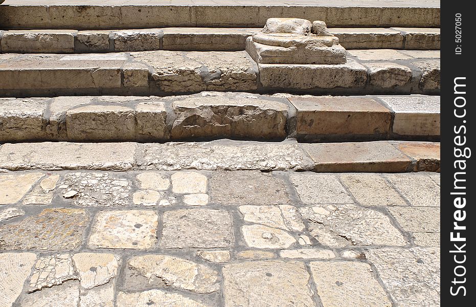 Ancient stone steps outside the Church of the Holy Sepulchre, Jerusalem. Ancient stone steps outside the Church of the Holy Sepulchre, Jerusalem.