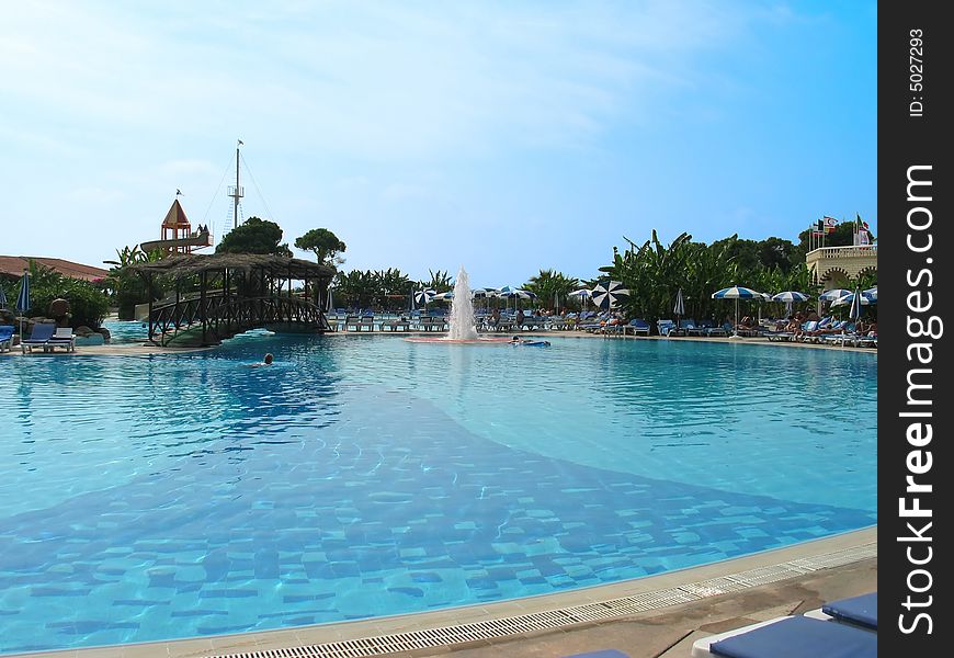 Hot summer day in the swimming pool