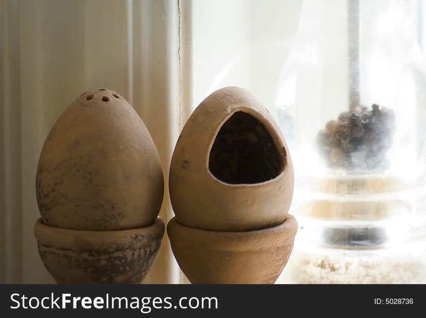 Ceramic salt and pepper shakers made as eggs served for breakfast. Ceramic salt and pepper shakers made as eggs served for breakfast