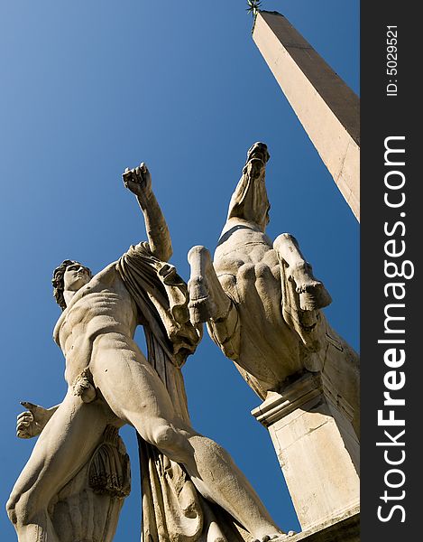 Ancient sculpture in Rome on blue sky. Ancient sculpture in Rome on blue sky