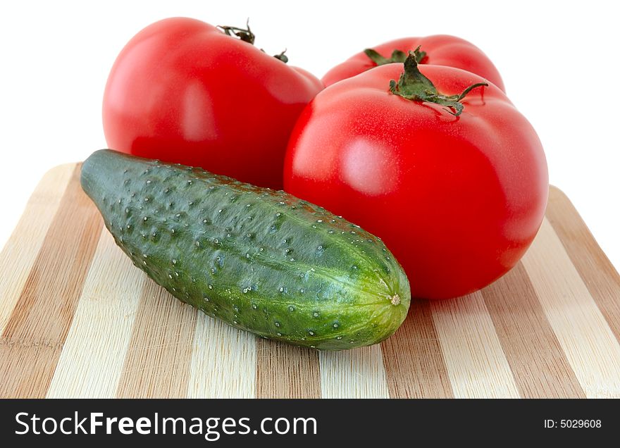 Vegetables on cutting board.