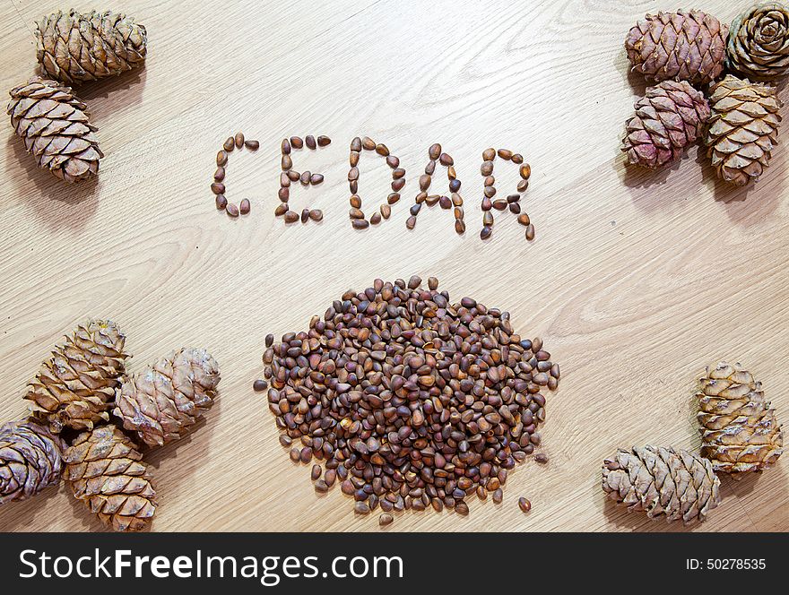 Cedar cones with nuts on the floor
