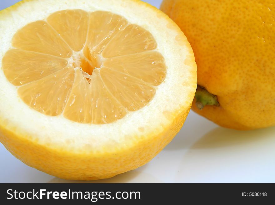 Yellow lemon on a white background