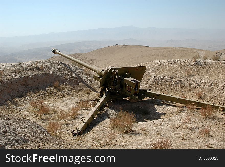 World war two artillery piece in the desert of afghanistan