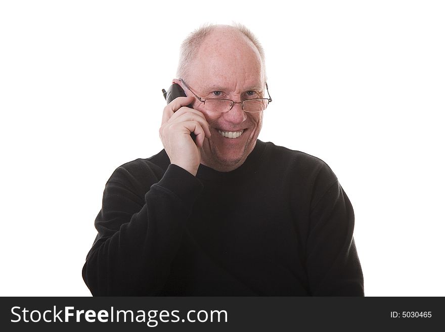 Old Guy In Black Shirt On Phone And Smiling