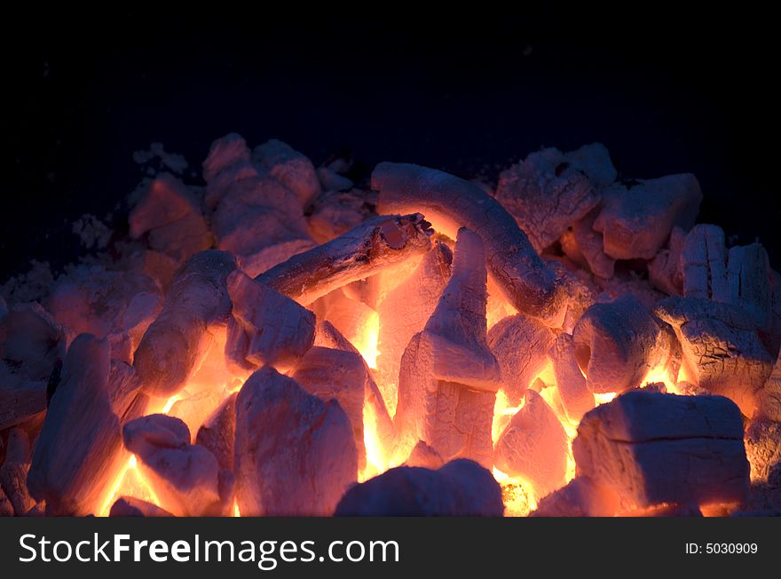 Live coals in evening garden