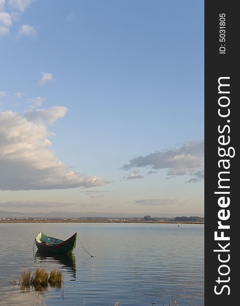 Traditional fishing boat at Ria de Aveiro lagoon, center-north Portugal. Traditional fishing boat at Ria de Aveiro lagoon, center-north Portugal