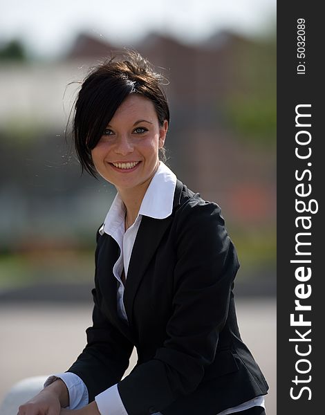 A young adult smiling portrait with office suit. A young adult smiling portrait with office suit