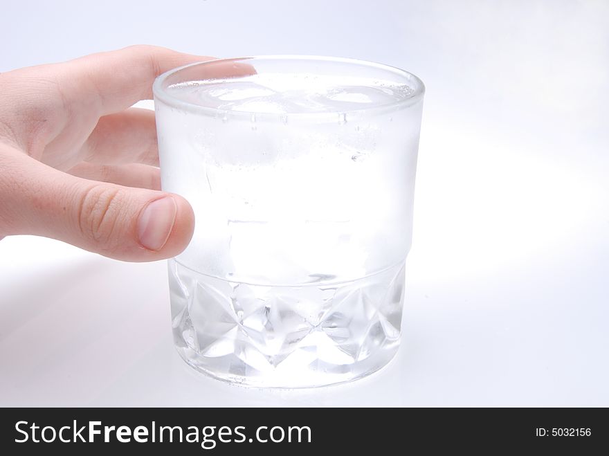 Glass of fresh water on white background