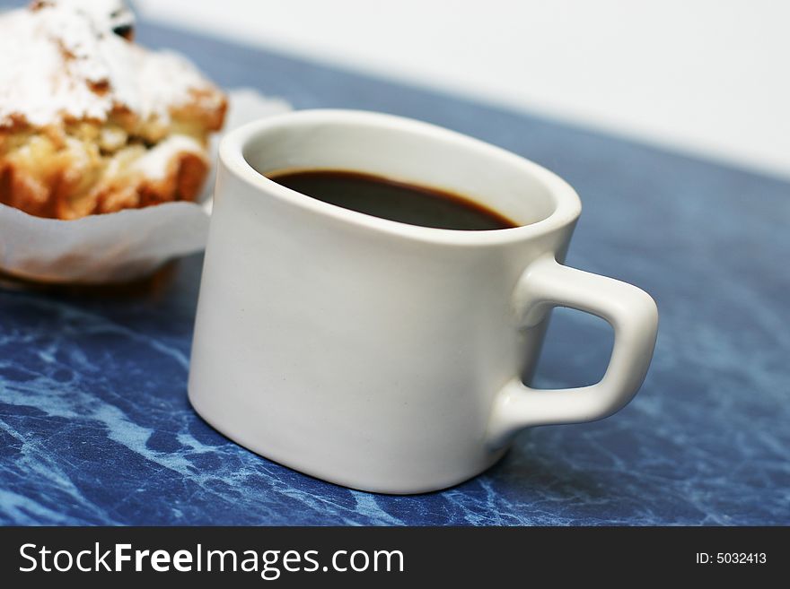 Light morning meal: black coffee and cakes