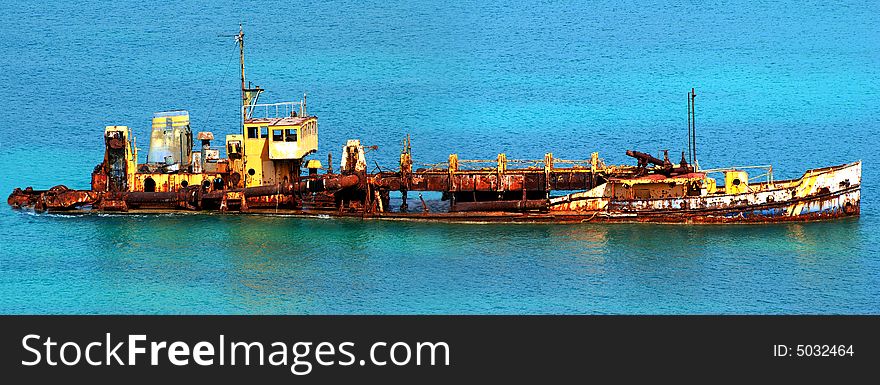 The panoramic view of a sunken ship near Marigot town, St.Martin island. The panoramic view of a sunken ship near Marigot town, St.Martin island.