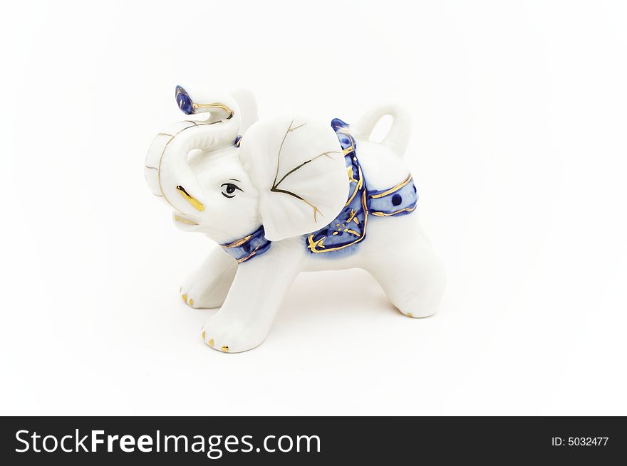 Figurine of elephant, isolated on white background.