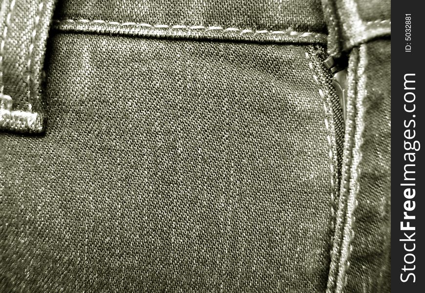 Structure of a jeans fabric, stitches and a zipper