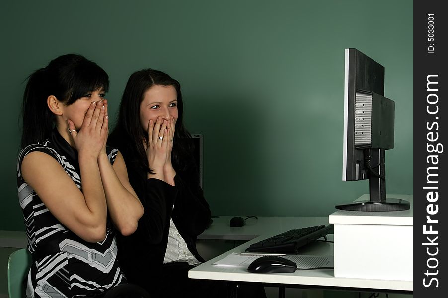 Two girls at the computer