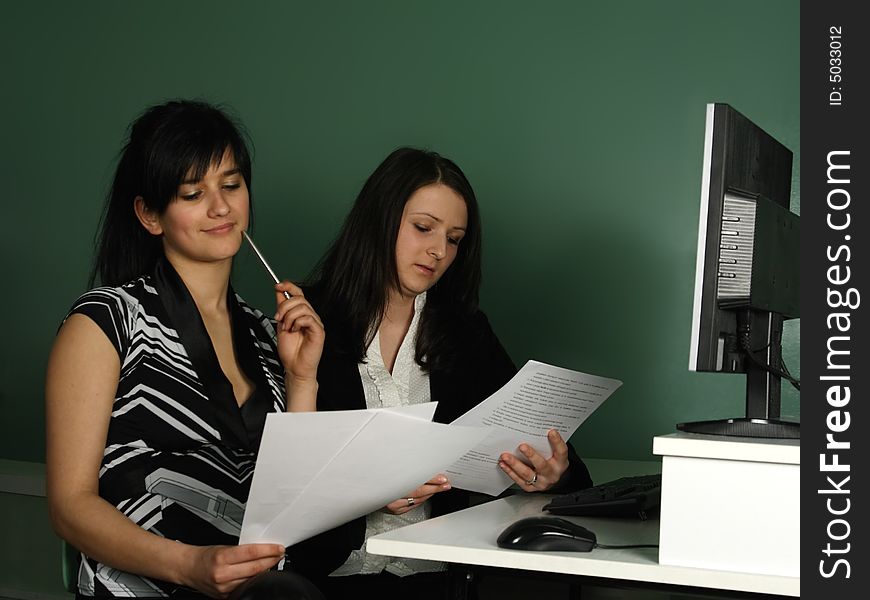 Two girls at the computer