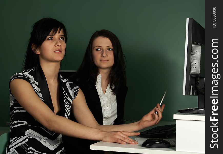 Two girls at the computer