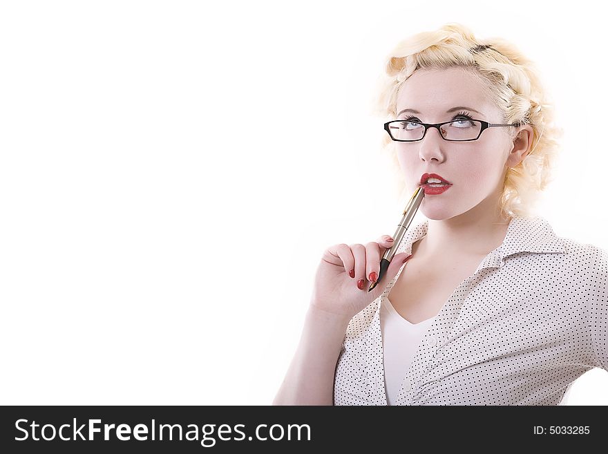 Attractive young girl with platinum blonde hair red accessories and jewellery. seductively playing with a pen. good eye contact. copy space to the right. Attractive young girl with platinum blonde hair red accessories and jewellery. seductively playing with a pen. good eye contact. copy space to the right