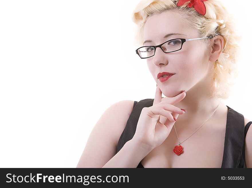 Attractive young girl with platinum blonde hair red accessories and jewellery. posing with a seductive look. Attractive young girl with platinum blonde hair red accessories and jewellery. posing with a seductive look