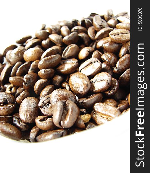 Natural black coffee beans closeup